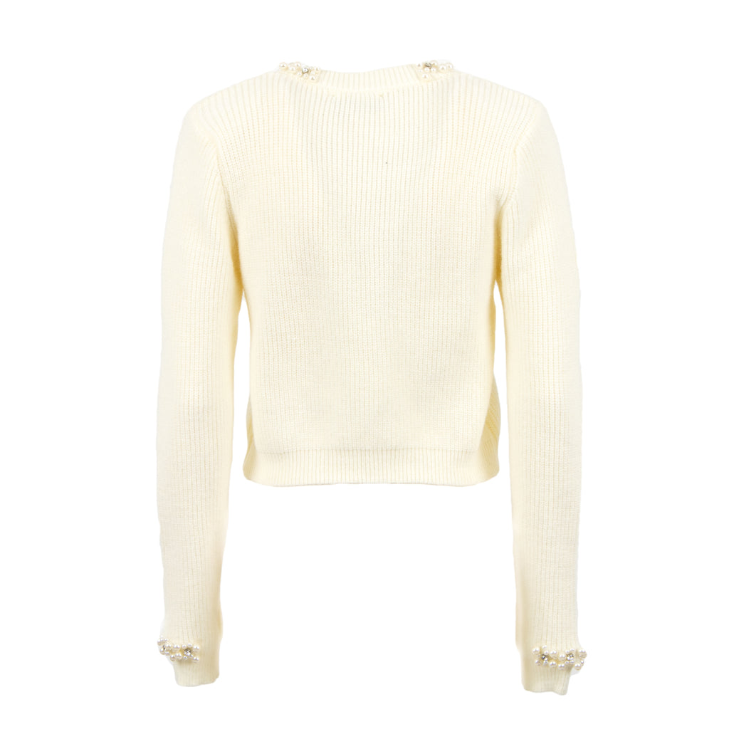 U R INK Lalin cream ribbed cardigan with decorative buttons and pearl-style embellishments at the neckline and cuffs, back view.