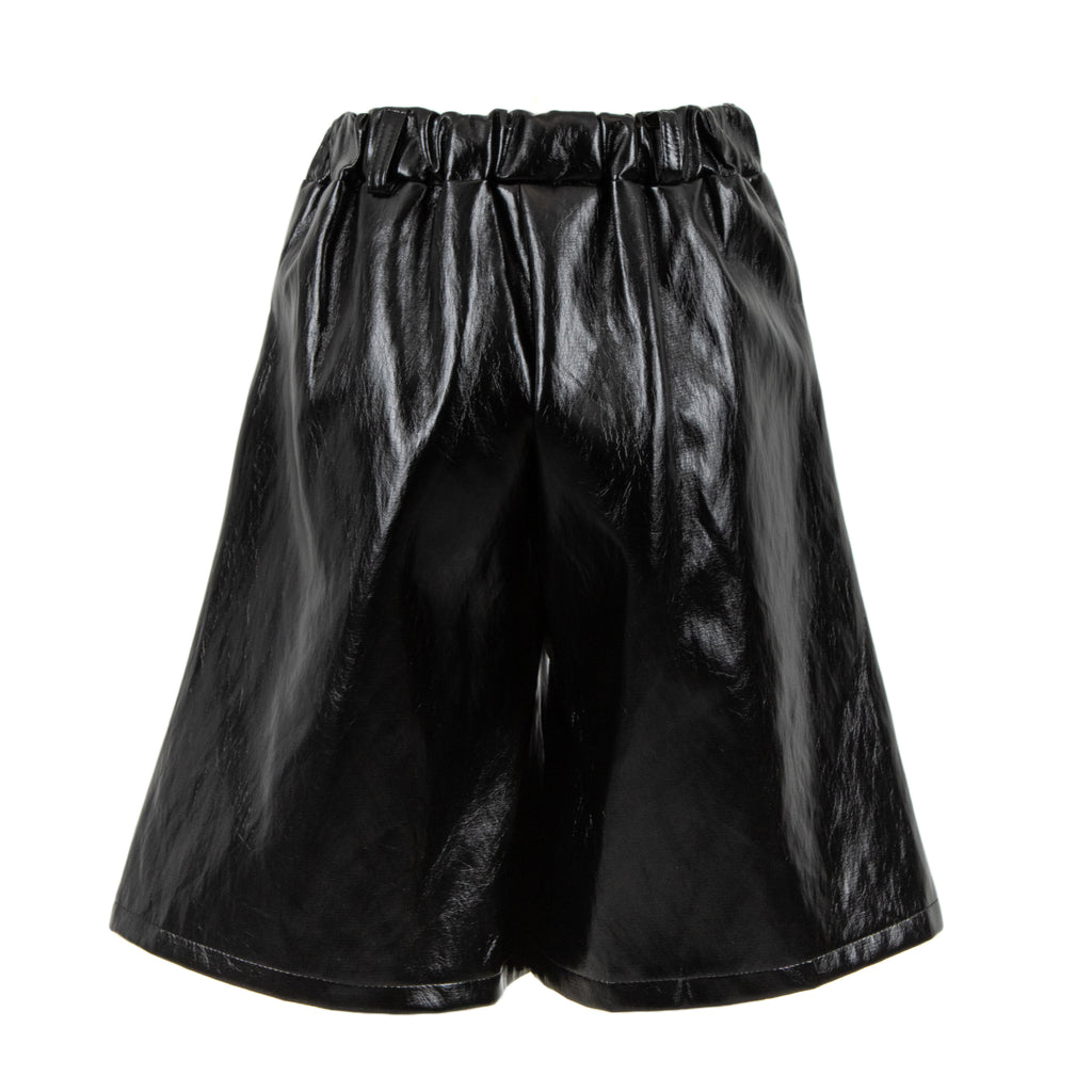 Black shiny faux-leather shorts with an elastic gathered waistband, shown against a plain white background.