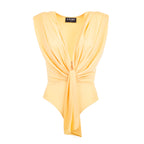 Yellow top with a knot detail on a white background