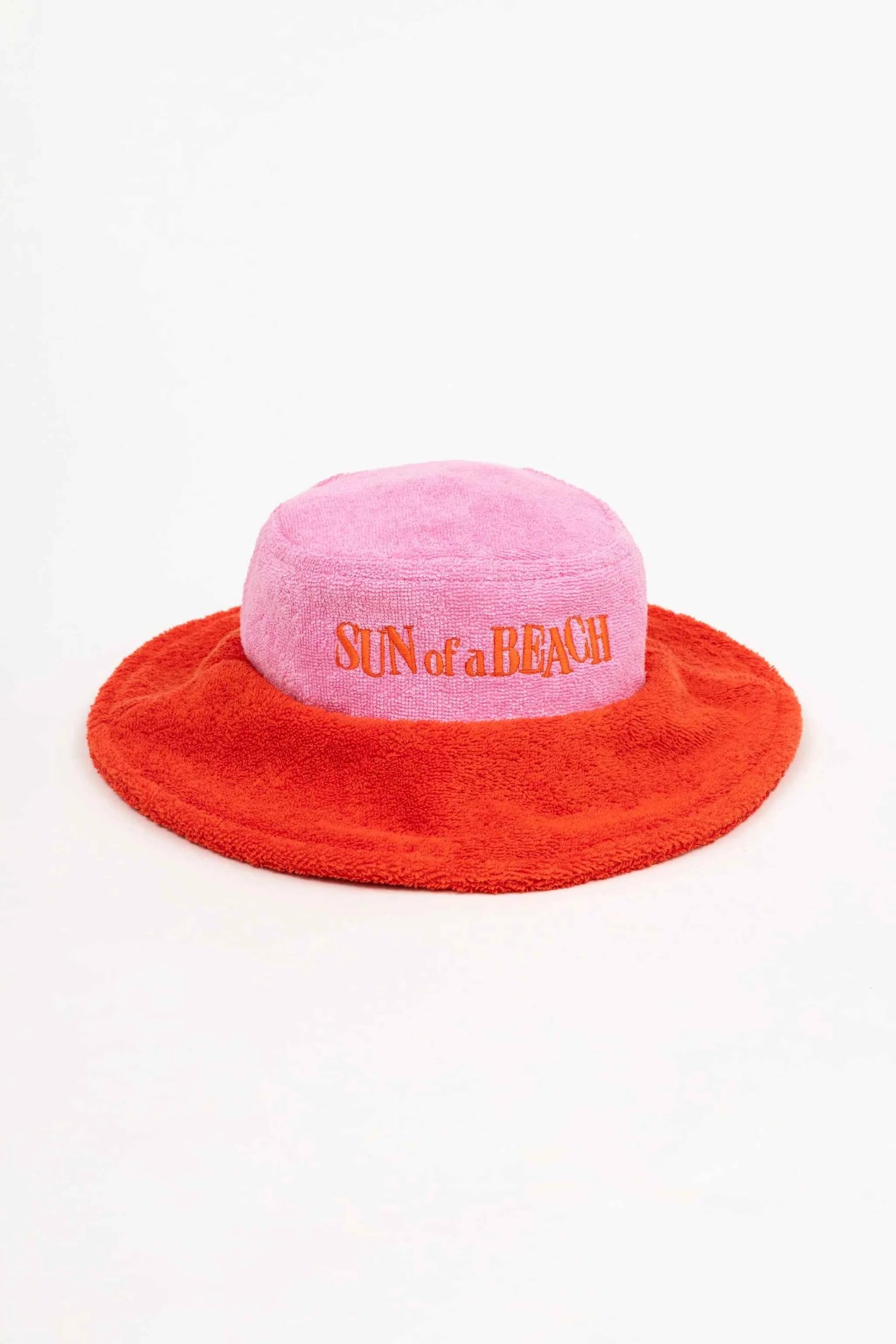 Pink and red bucket hat with 'Sun of a Beach' text on a white background