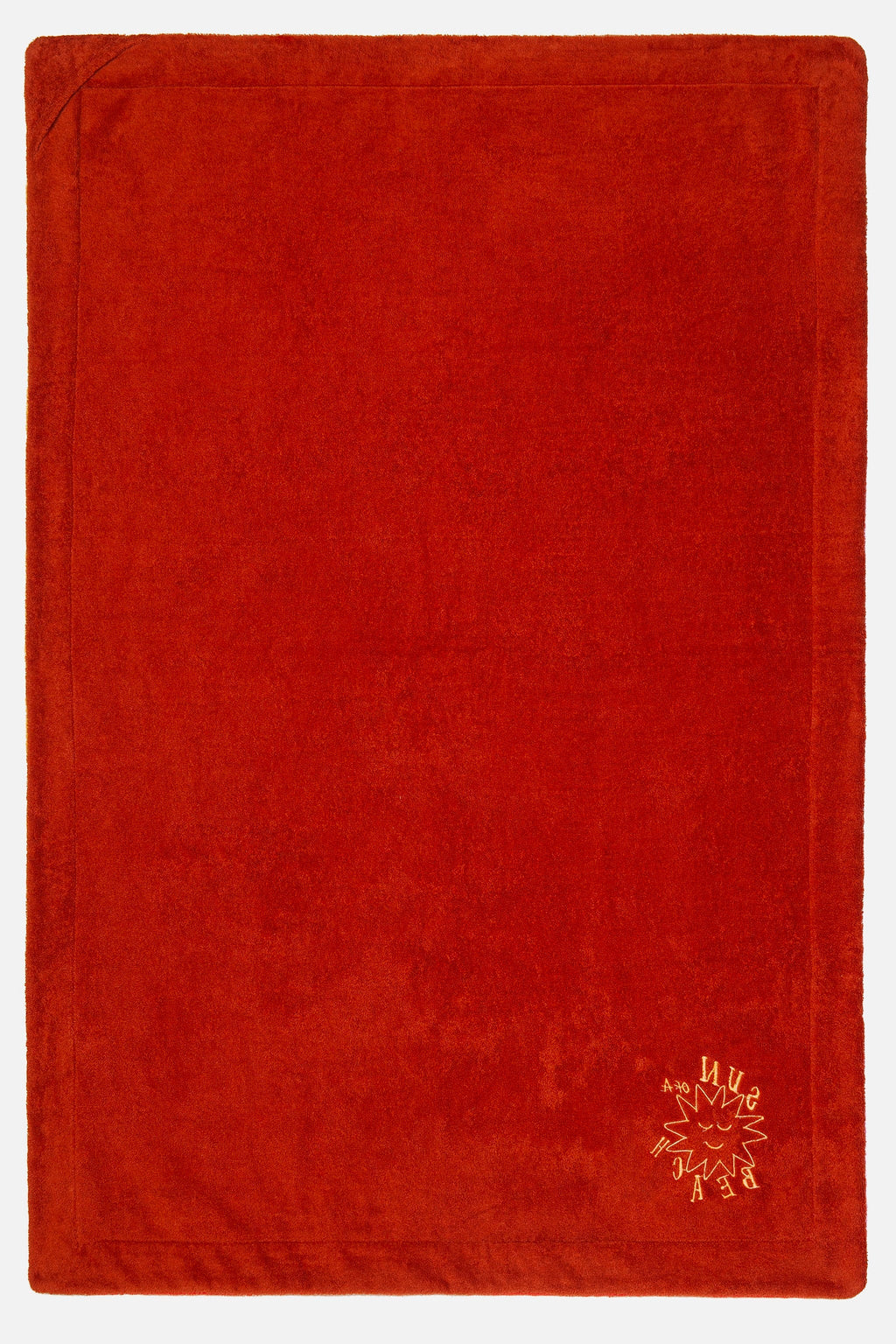 Red textured fabric with a small logo in the corner on a white background