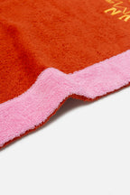 Close-up of a red and pink textured product corner
