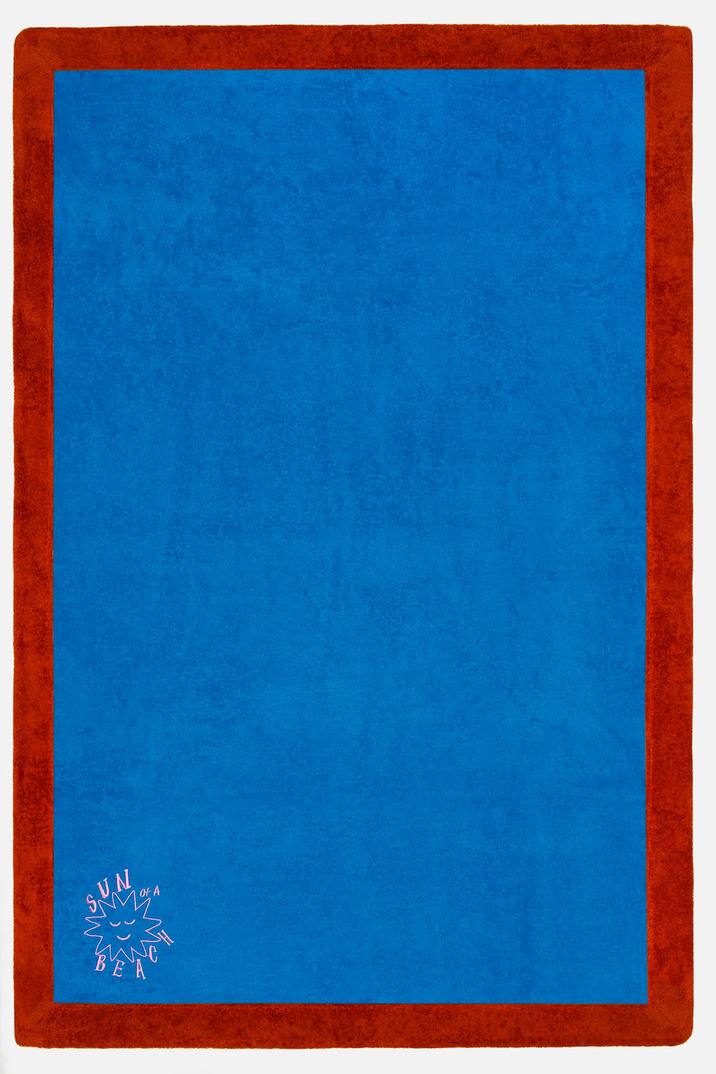 Blue mat with red border and a logo in the corner