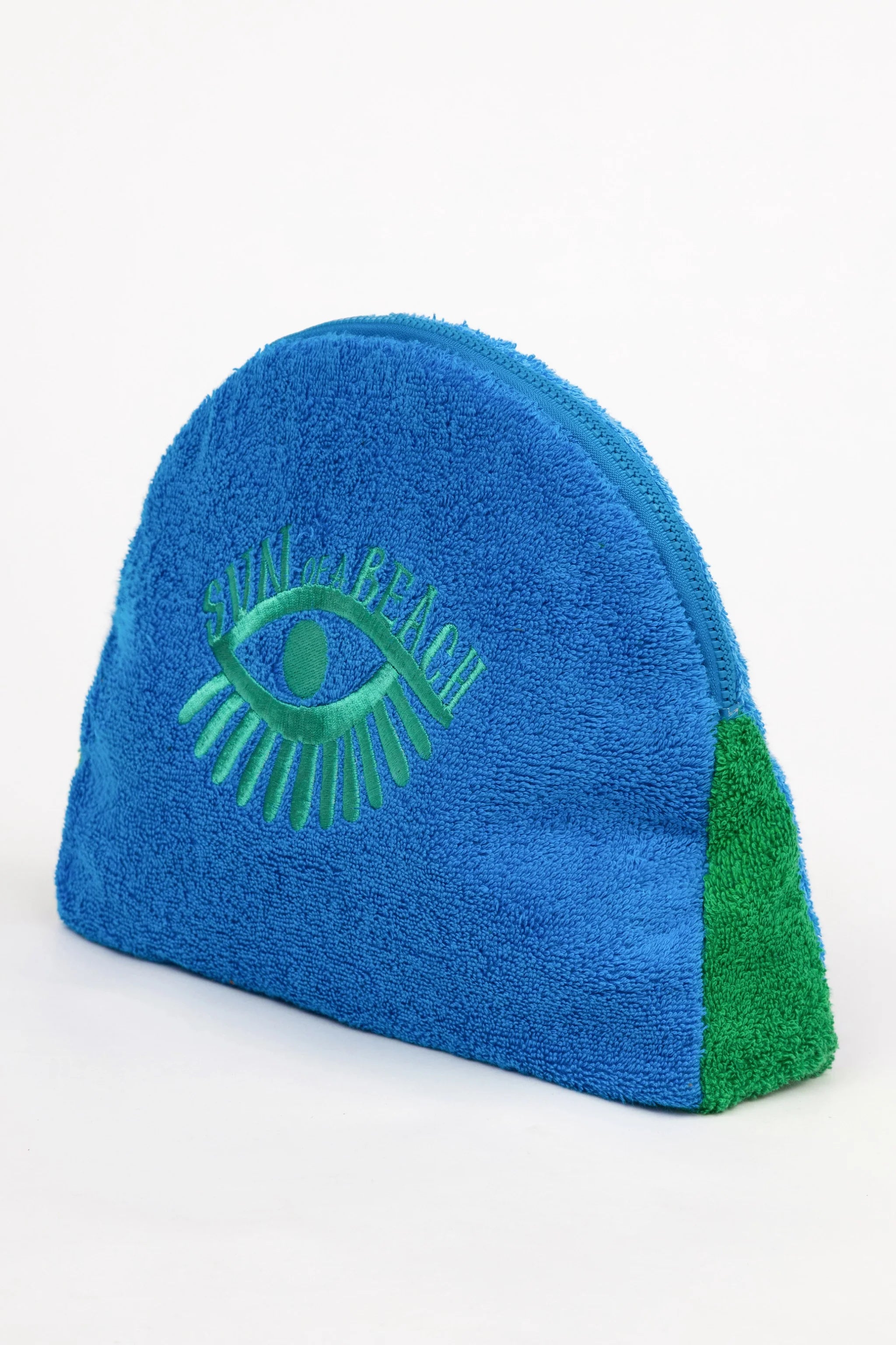 Blue and green eye-shaped object on a white background