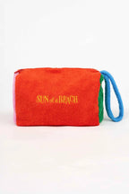 Red pouch with 'Sun of a Beach' text on a white background