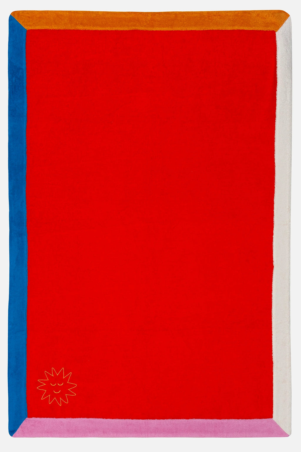 Red rectangular mat with colorful border and logo in the corner