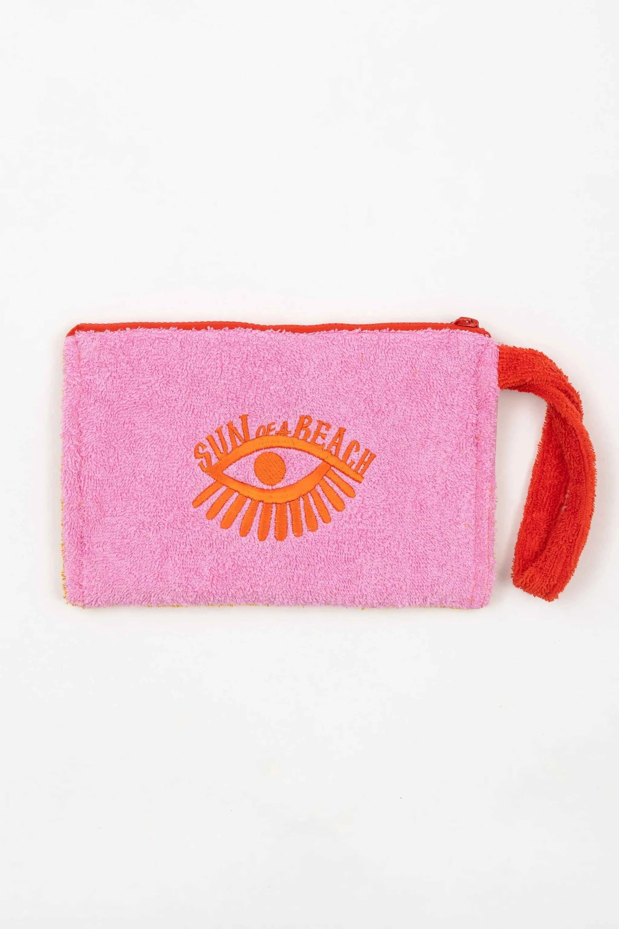 Pink pouch with orange eye logo and 'Sun at the Beach' text on a white background