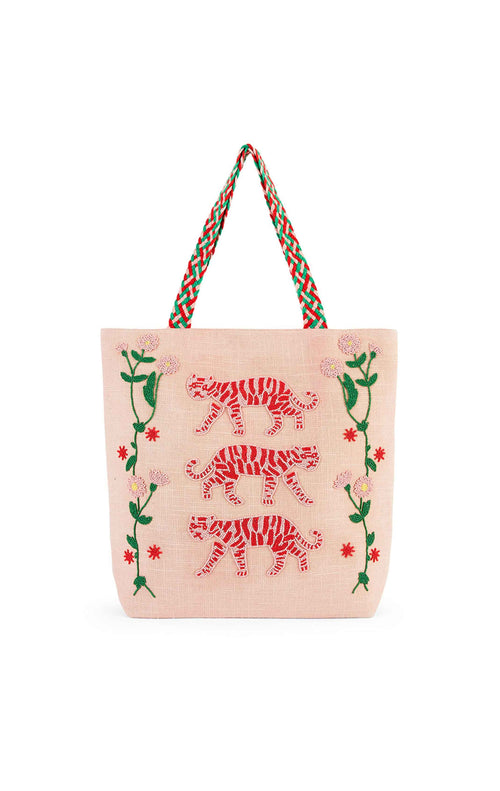 Tote bag with tiger design and braided handles on a white background