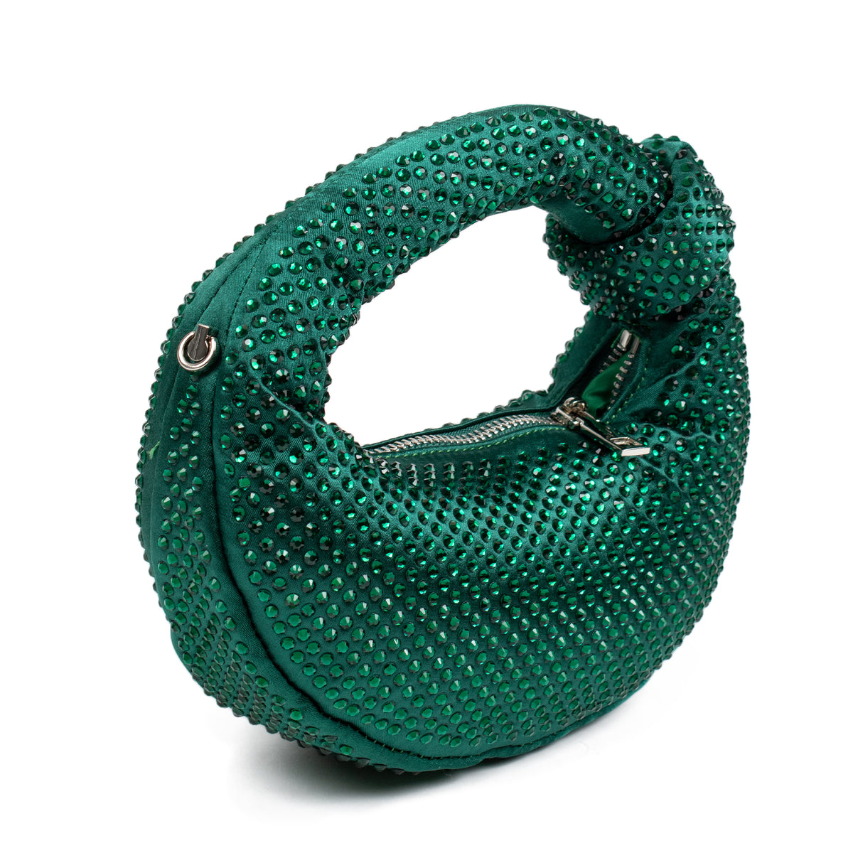 A green rhinestone-embellished crescent shoulder bag with a curved, looped silhouette and a silver zipper, shown on a white background.
