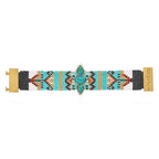 Beaded bracelet with geometric pattern and turquoise stones on a white background