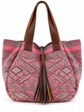 A pink and brown patterned tote bag with textured brown faux-leather handles and a matching tassel detail, shown against a plain white background.