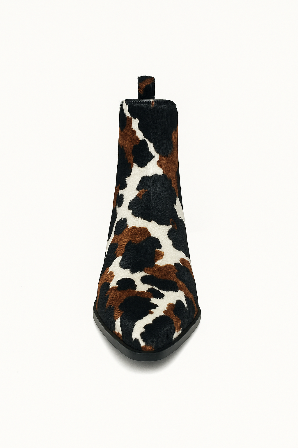 Cow print boot on a white background