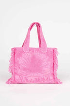 Pink tie-dye tote bag with 'Sunaura' branding on a white background