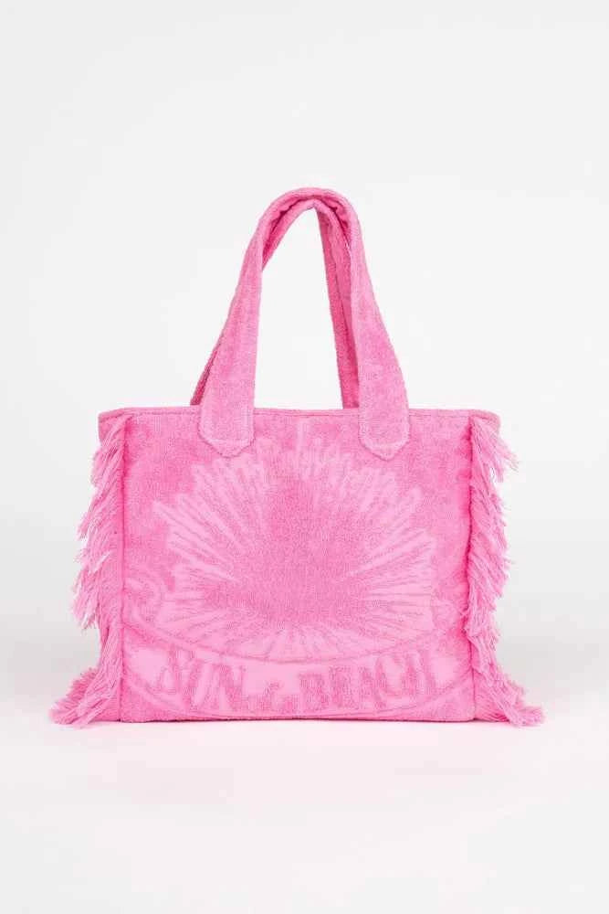 Pink tie-dye tote bag with 'Sunaura' branding on a white background