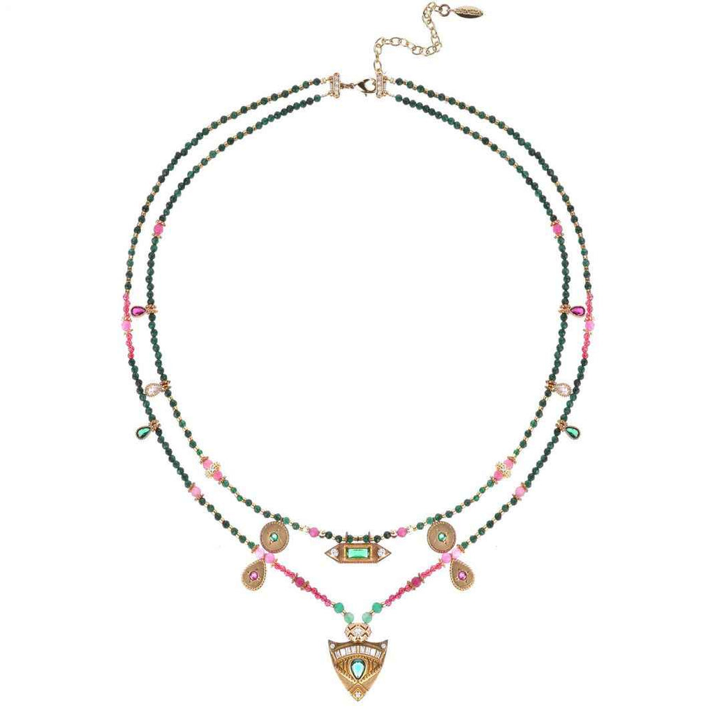 Multicolored beaded necklace with decorative elements on a white background