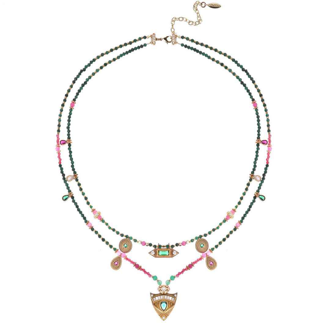 Multicolored beaded necklace with decorative elements on a white background