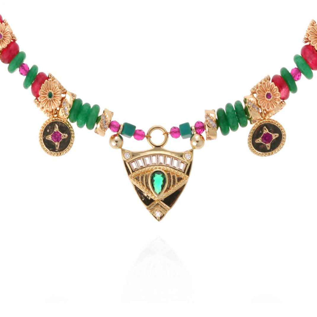 Colorful beaded necklace with gold and black accents on a white background