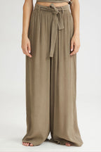 Brown wide-leg pants with a belt on a white background
