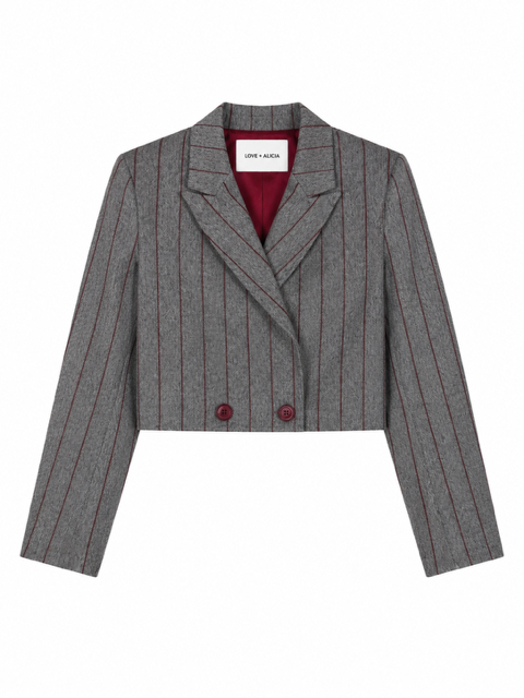 A cropped double-breasted blazer in gray herringbone fabric with thin red pinstripes, featuring a deep V-neckline, notched lapels, and two red buttons. The brand label 'LINE + AIGLE' is visible inside the collar.