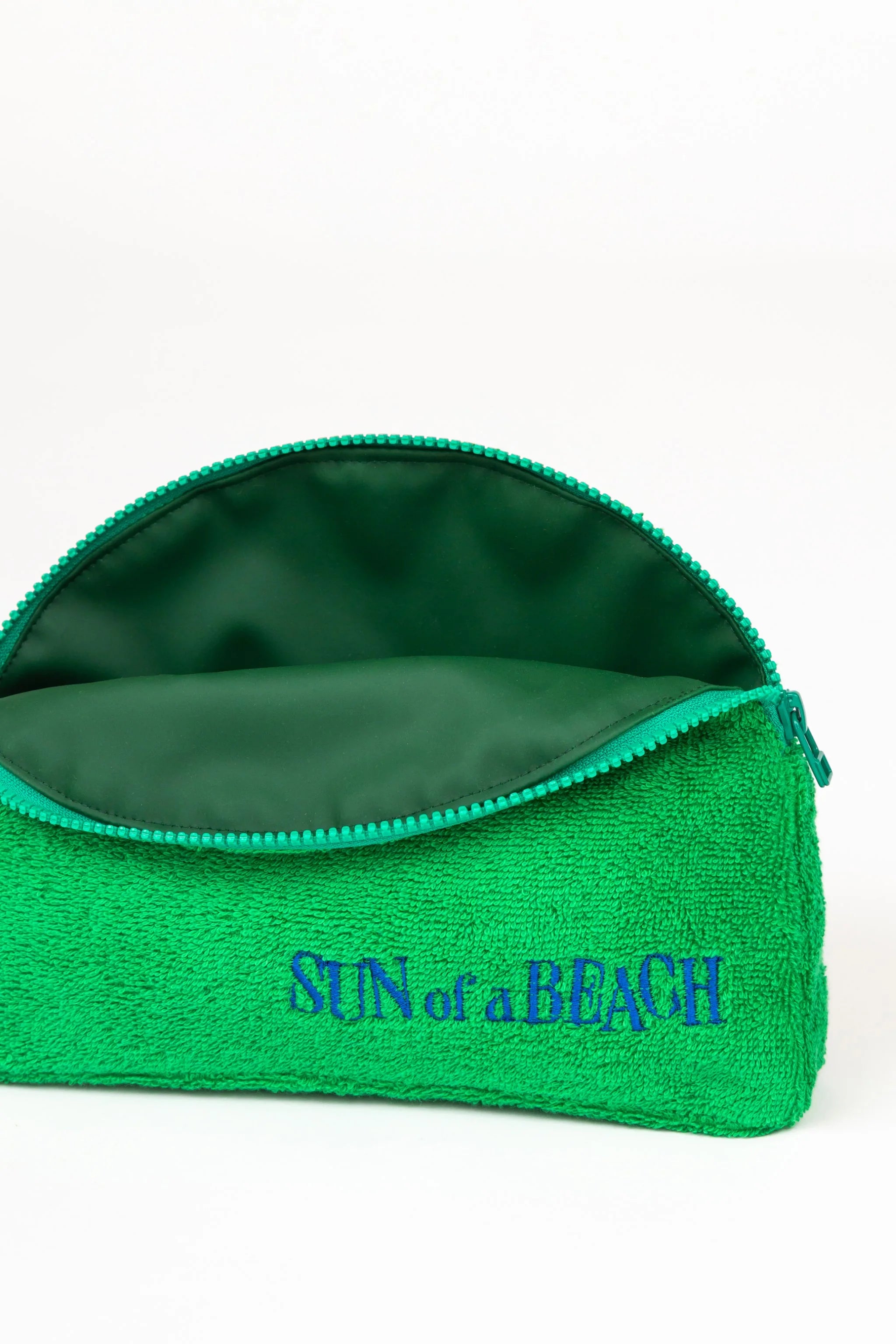 Green pouch with 'Sun of a Beach' text on a white background