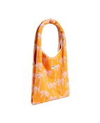 An orange hobo-style tote bag with a white palm tree pattern, featuring a small white 'WOUF' brand label on the front, set against a plain white background.