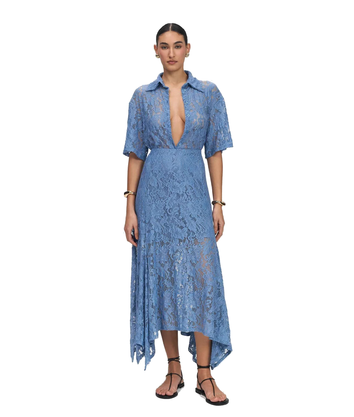 A woman modeling a light blue lace midi dress with short sleeves, a deep plunging neckline, and an asymmetrical high-low hem, set against a plain white background.