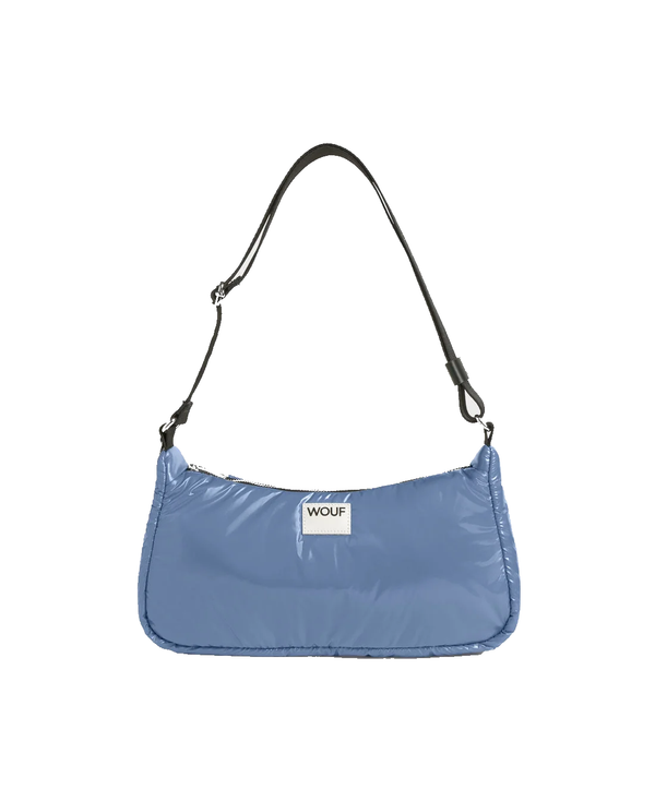 A light blue nylon shoulder bag with a black adjustable strap and a small white brand label reading 'WOLF' on the front, set against a plain white background.