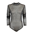 A sheer black long-sleeve leotard bodysuit with silver rhinestone embellishments, a high collar with rhinestone trim, and ruched sleeves, shown against a plain white background.